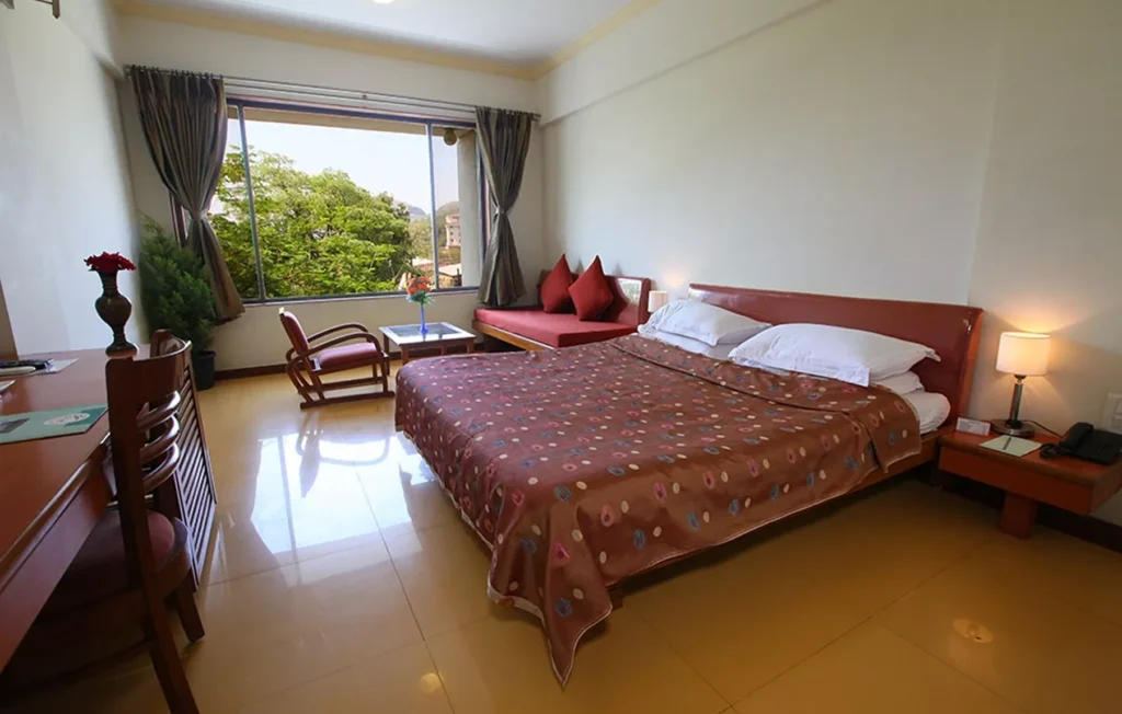 Deluxe AC room at Shilpi Hill Resort Saputara